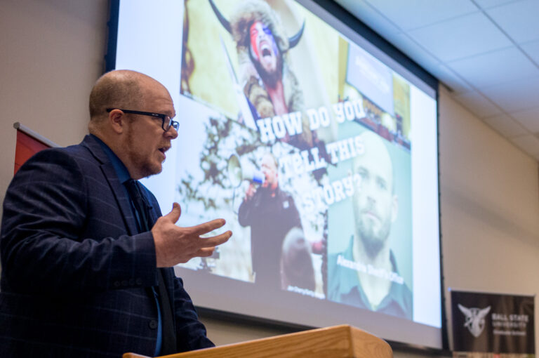 EMDD students Zainab Aamir and Matt Lowe compete in the 2023 Three-Minute Thesis competition at Ball State University's Emmens Auditorium, Thursday, February 23, 2023. Aamir won both the competition and the People's Choice award for her project on privacy in virtual reality, and Lowe won third place for his project comparing the transmedia stopry structures resulting from the January 6 Commission Report.