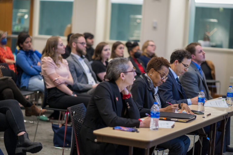 EMDD students Zainab Aamir and Matt Lowe compete in the 2023 Three-Minute Thesis competition at Ball State University's Emmens Auditorium, Thursday, February 23, 2023. Aamir won both the competition and the People's Choice award for her project on privacy in virtual reality, and Lowe won third place for his project comparing the transmedia stopry structures resulting from the January 6 Commission Report.