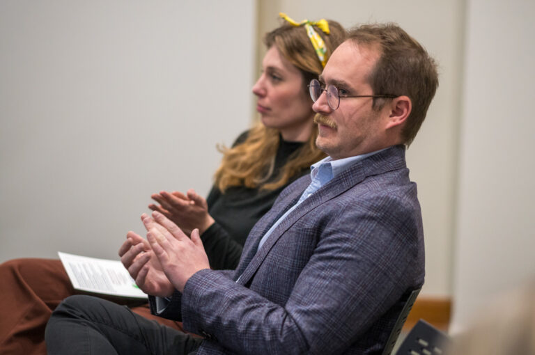 EMDD students Zainab Aamir and Matt Lowe compete in the 2023 Three-Minute Thesis competition at Ball State University's Emmens Auditorium, Thursday, February 23, 2023. Aamir won both the competition and the People's Choice award for her project on privacy in virtual reality, and Lowe won third place for his project comparing the transmedia stopry structures resulting from the January 6 Commission Report.